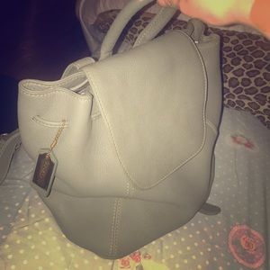 Grey bag coach